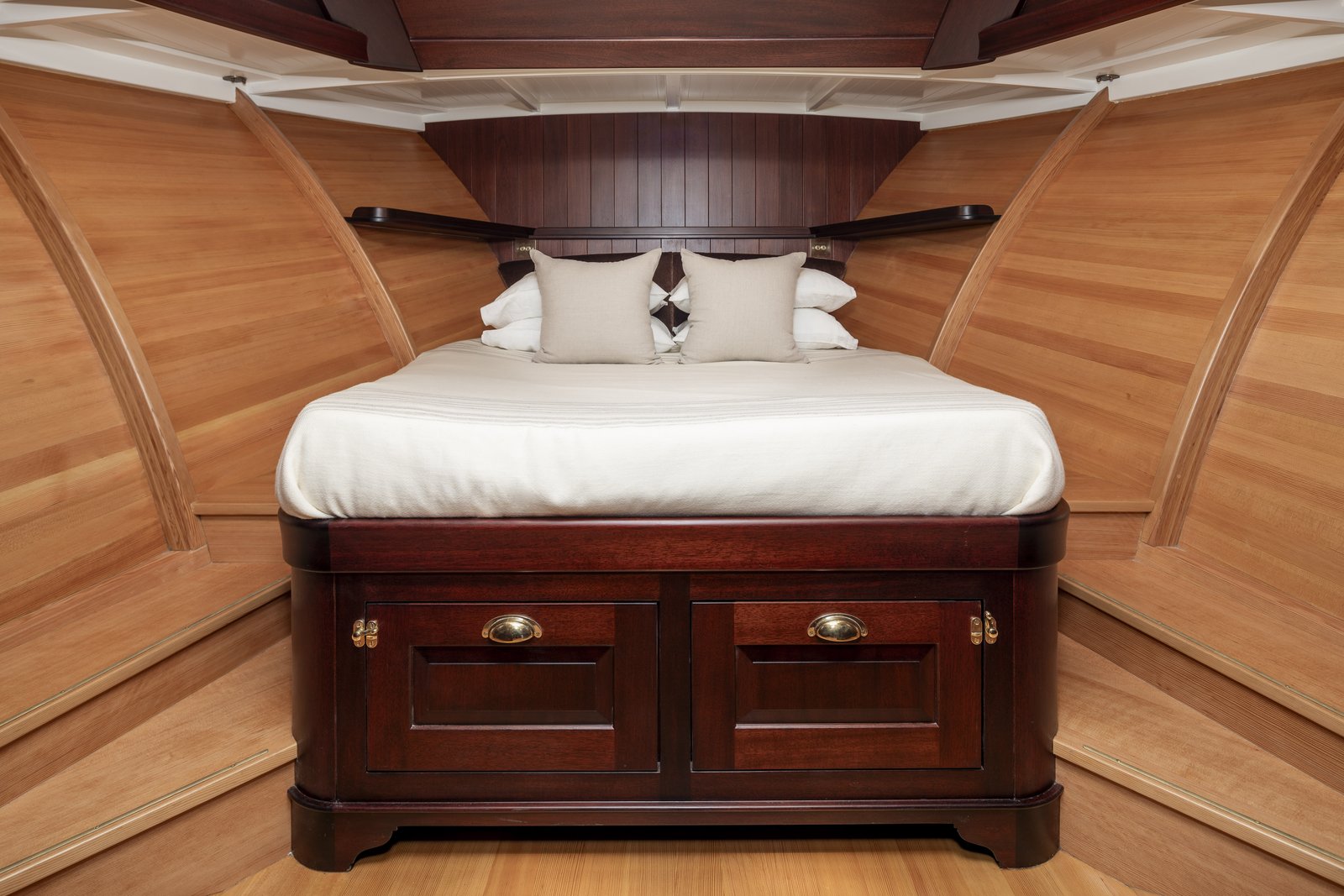 Main cabin in the bow, panelled in wood. Photo: Cory Silken